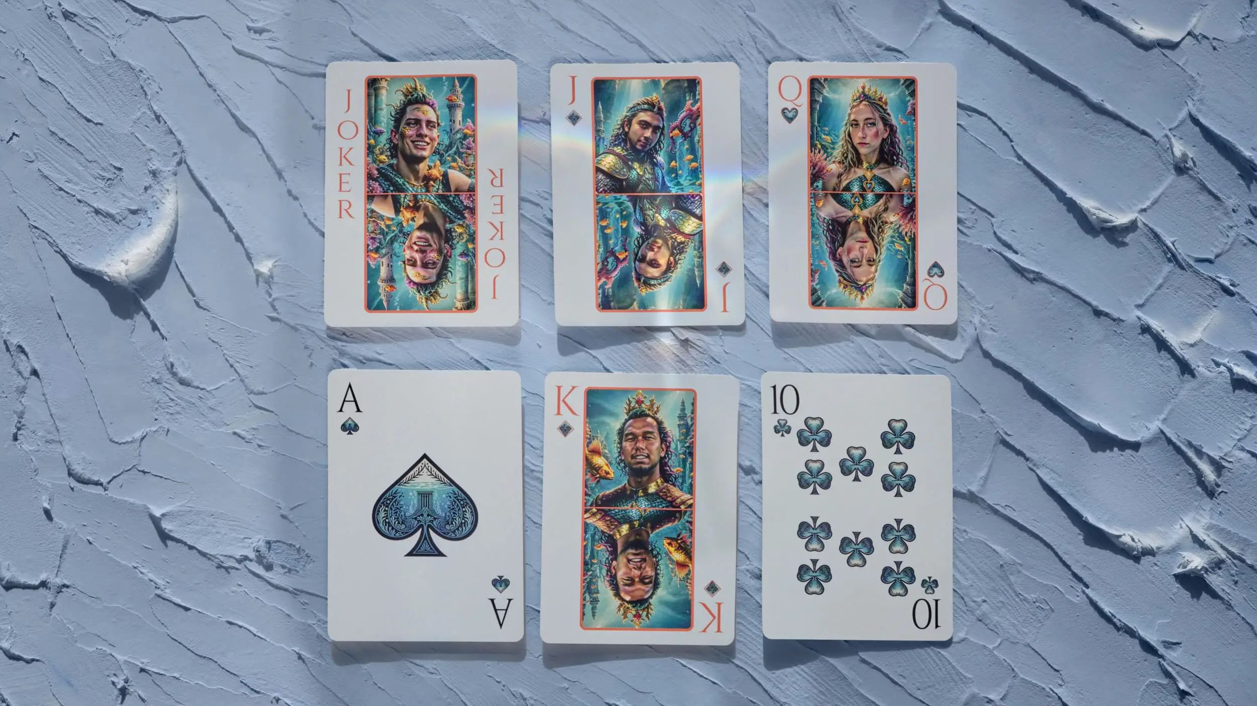 Custom playing cards featuring friends and family faces